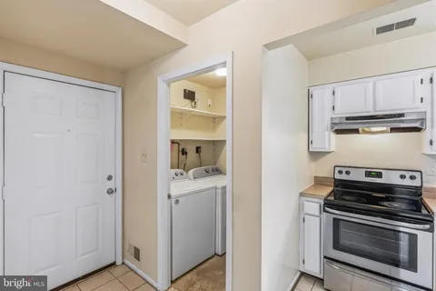 a view of kitchen and sink