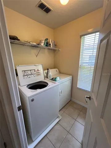 a view of utility room with washer and dryer