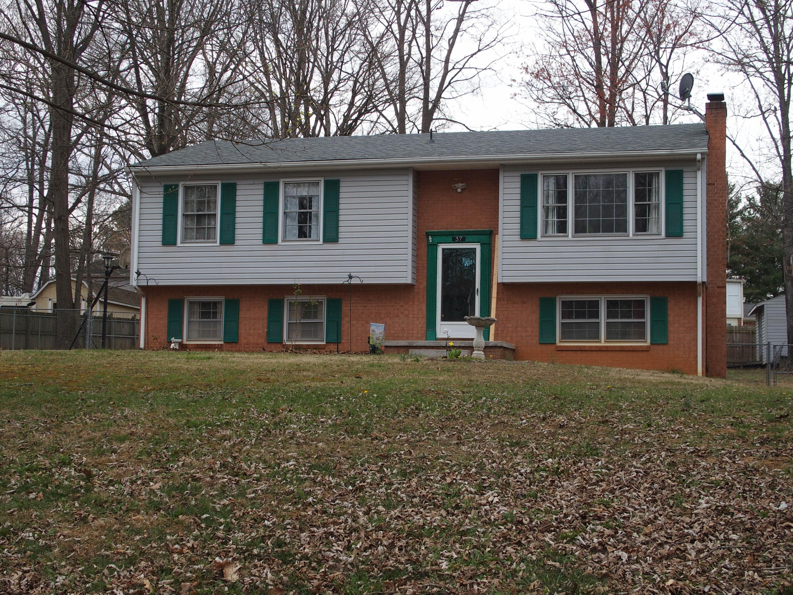 37 Cedarbrook Lane Blue Ridge, VA 24064 - Photo 1 of 21 a front view of a house with garden