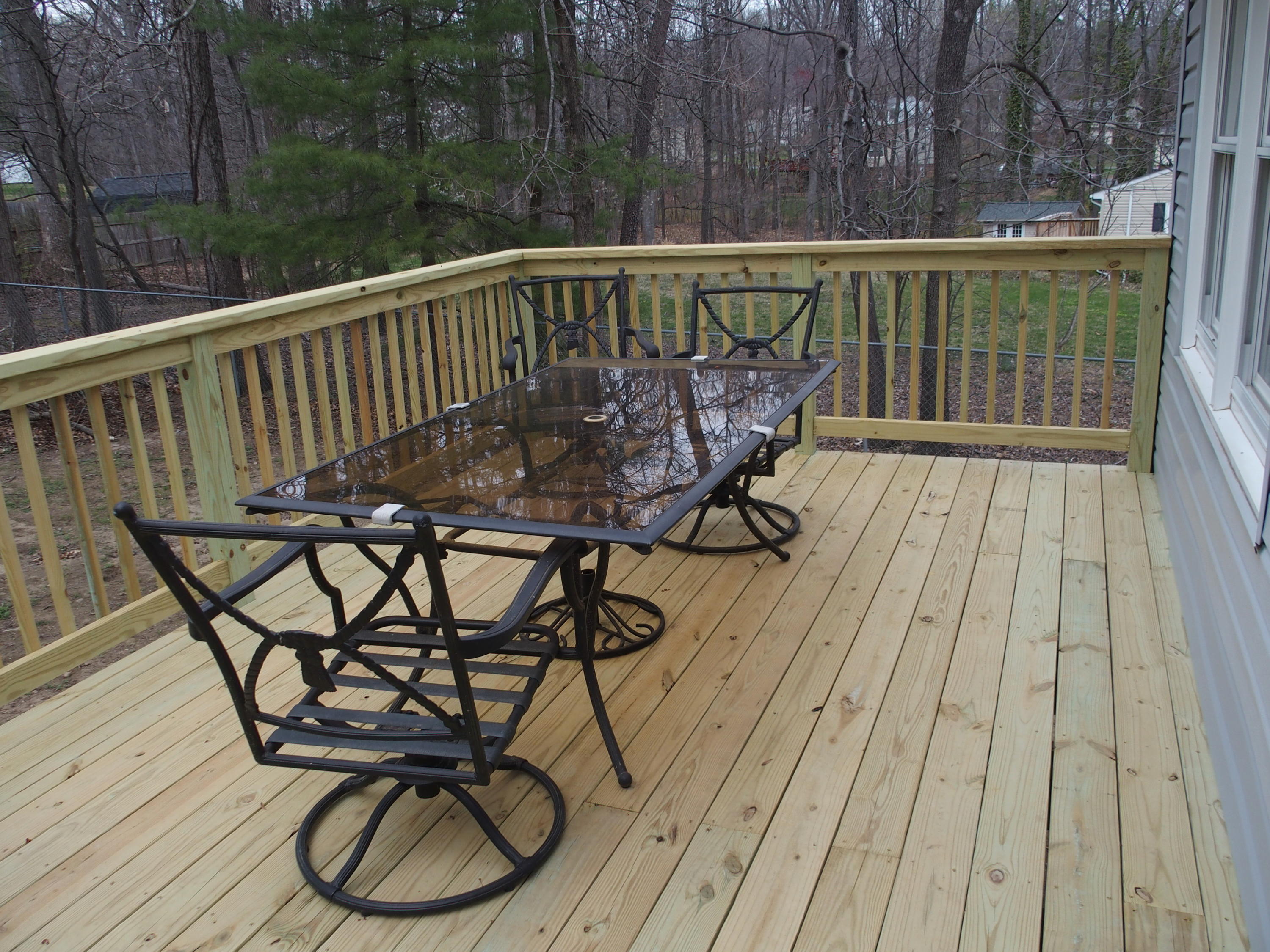 37 Cedarbrook Lane Blue Ridge, VA 24064 - Photo 16 of 21 a view of a wooden chairs on deck with white floor