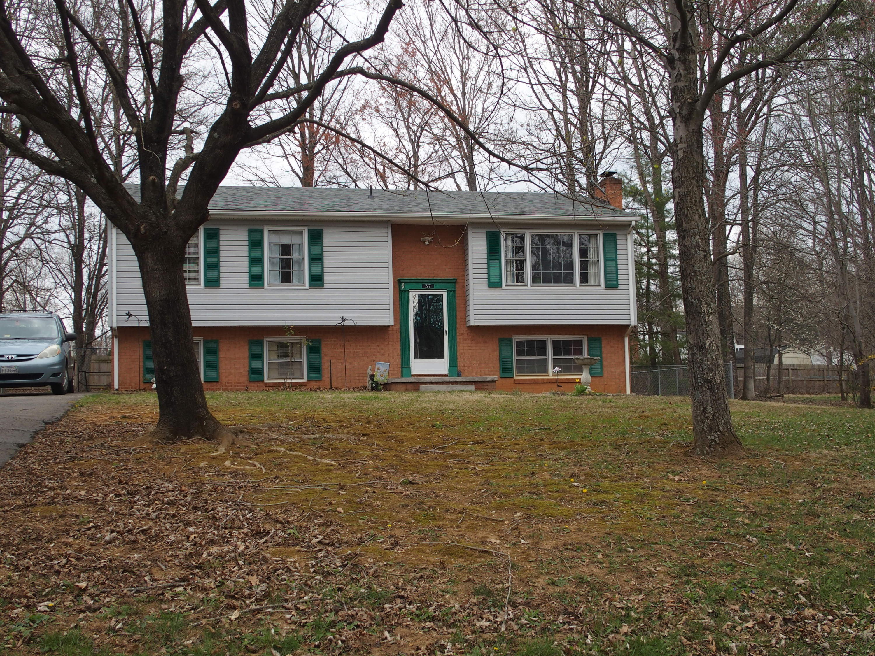 37 Cedarbrook Lane Blue Ridge, VA 24064 - Photo 21 of 21 a front view of house with yard and trees