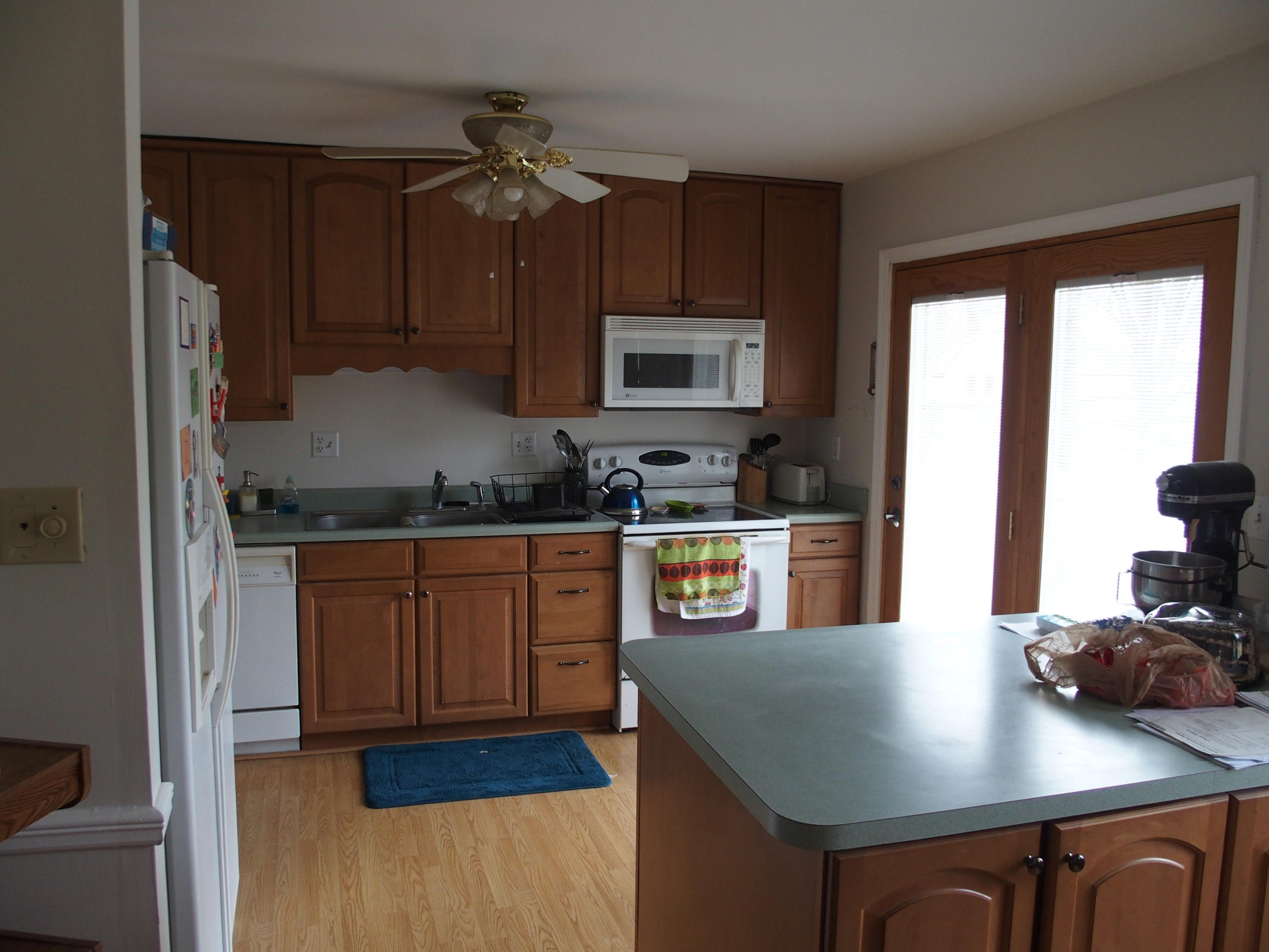 37 Cedarbrook Lane Blue Ridge, VA 24064 - Photo 9 of 21 a kitchen with stainless steel appliances granite countertop a sink a stove and a refrigerator