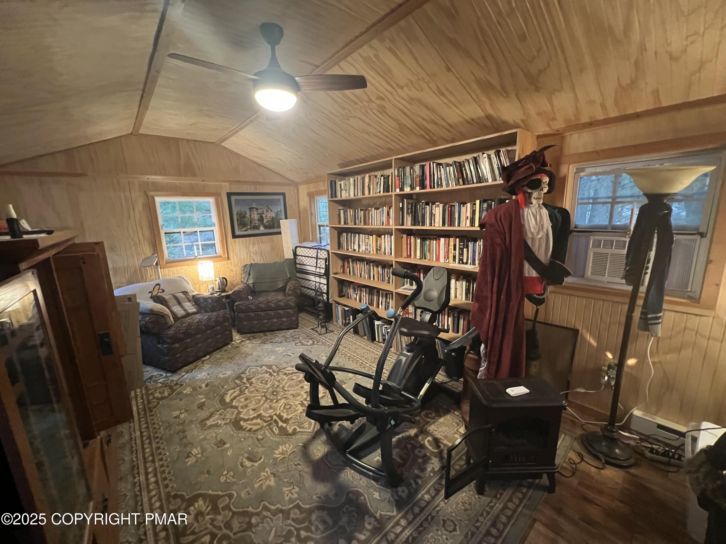 25 Red Oak Road Lake Harmony, PA 18624 - Photo 14 of 23 a view of a livingroom with furniture and a ceiling fan