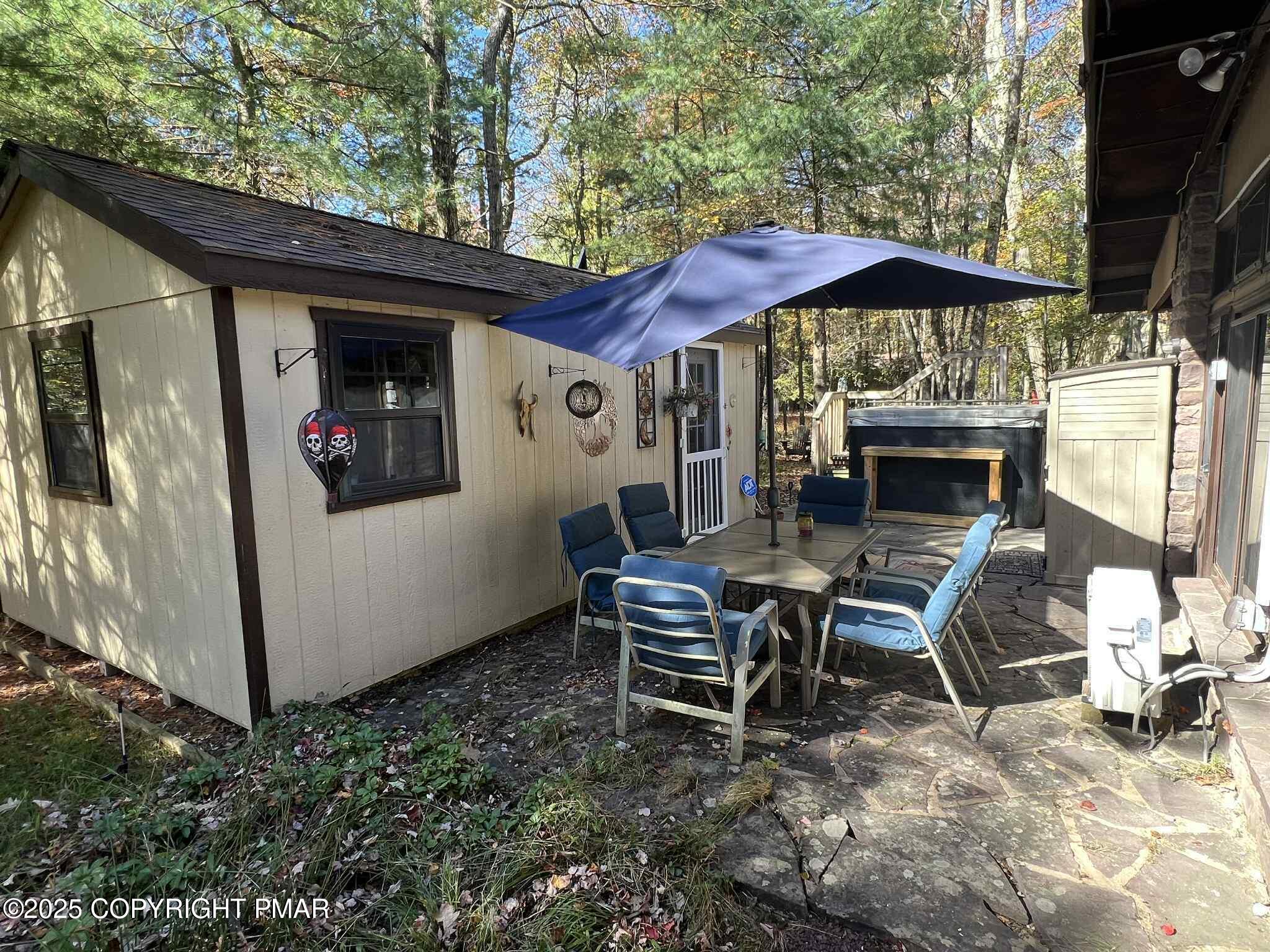 25 Red Oak Road Lake Harmony, PA 18624 - Photo 19 of 23 a patio with table and chairs
