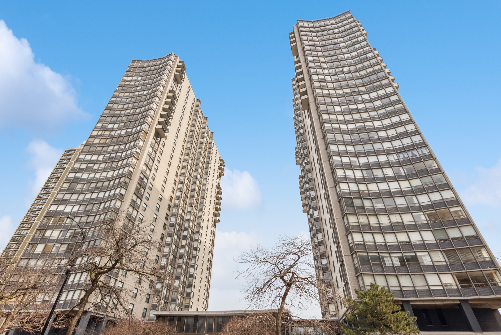 5701 North Sheridan Road, Unit 30D Chicago, IL 60660 - Photo 1 of 16 a view of a tall building