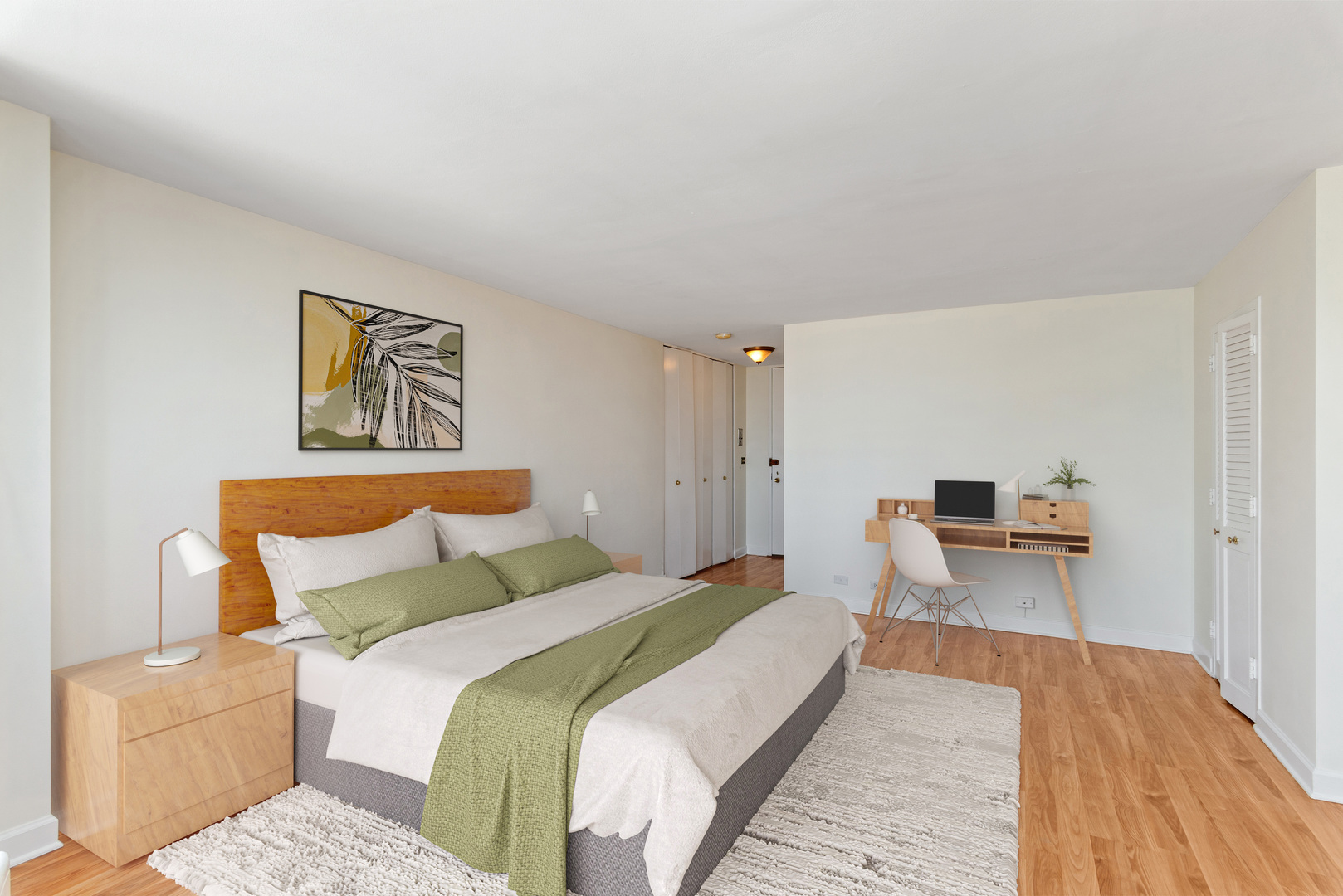 5701 North Sheridan Road, Unit 30D Chicago, IL 60660 - Photo 11 of 16 a bedroom with a bed and painting on the wall