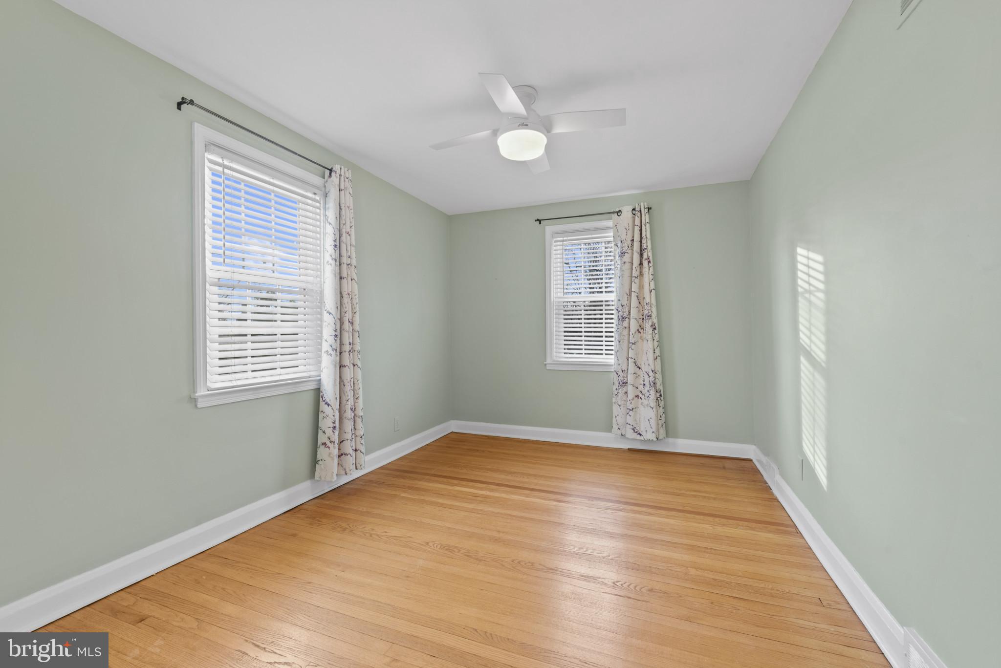 169 Regester Avenue Baltimore, MD 21212 - Photo 15 of 30 Bright and airy room with fresh green walls.