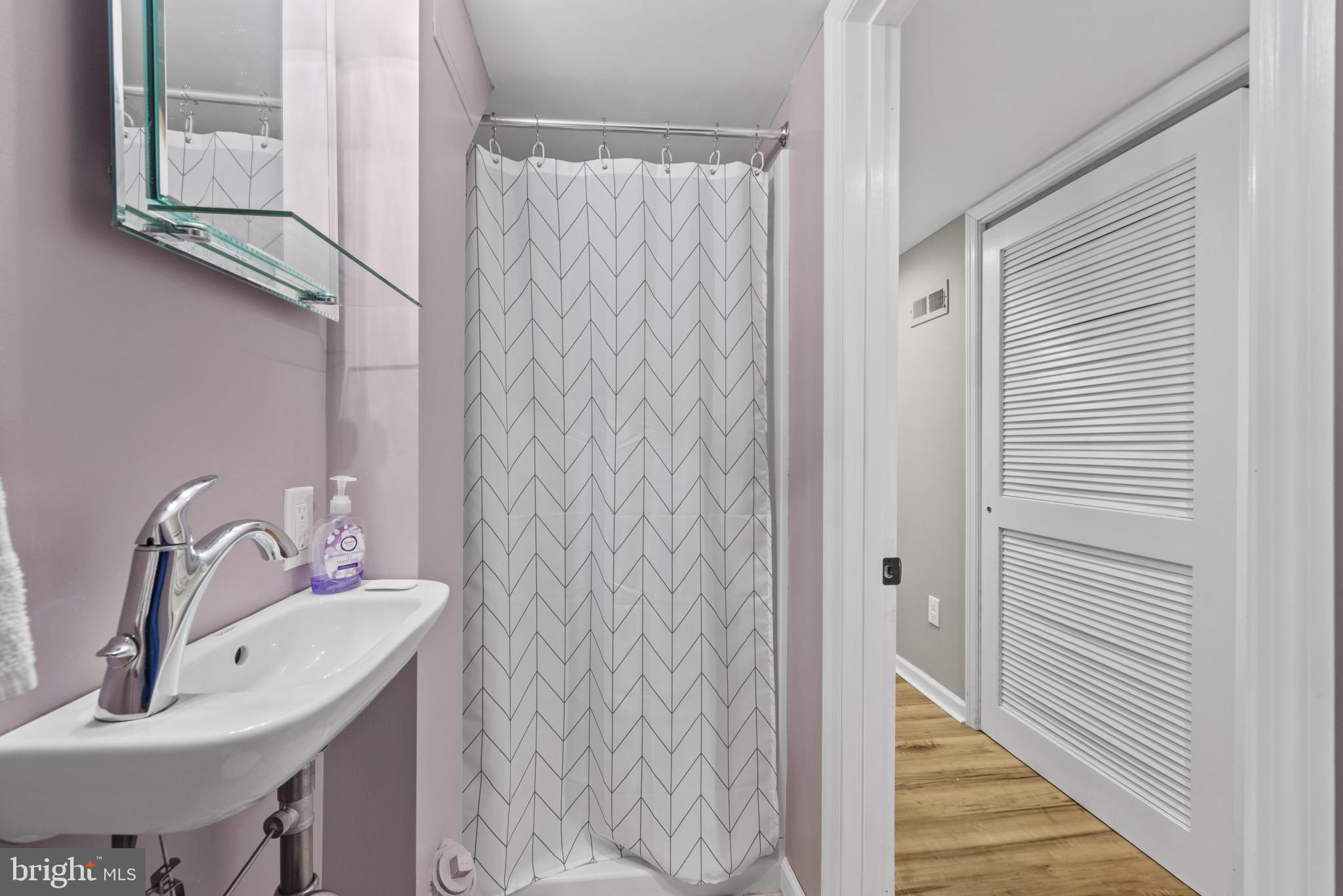 169 Regester Avenue Baltimore, MD 21212 - Photo 19 of 30 Charming bathroom with modern accents.