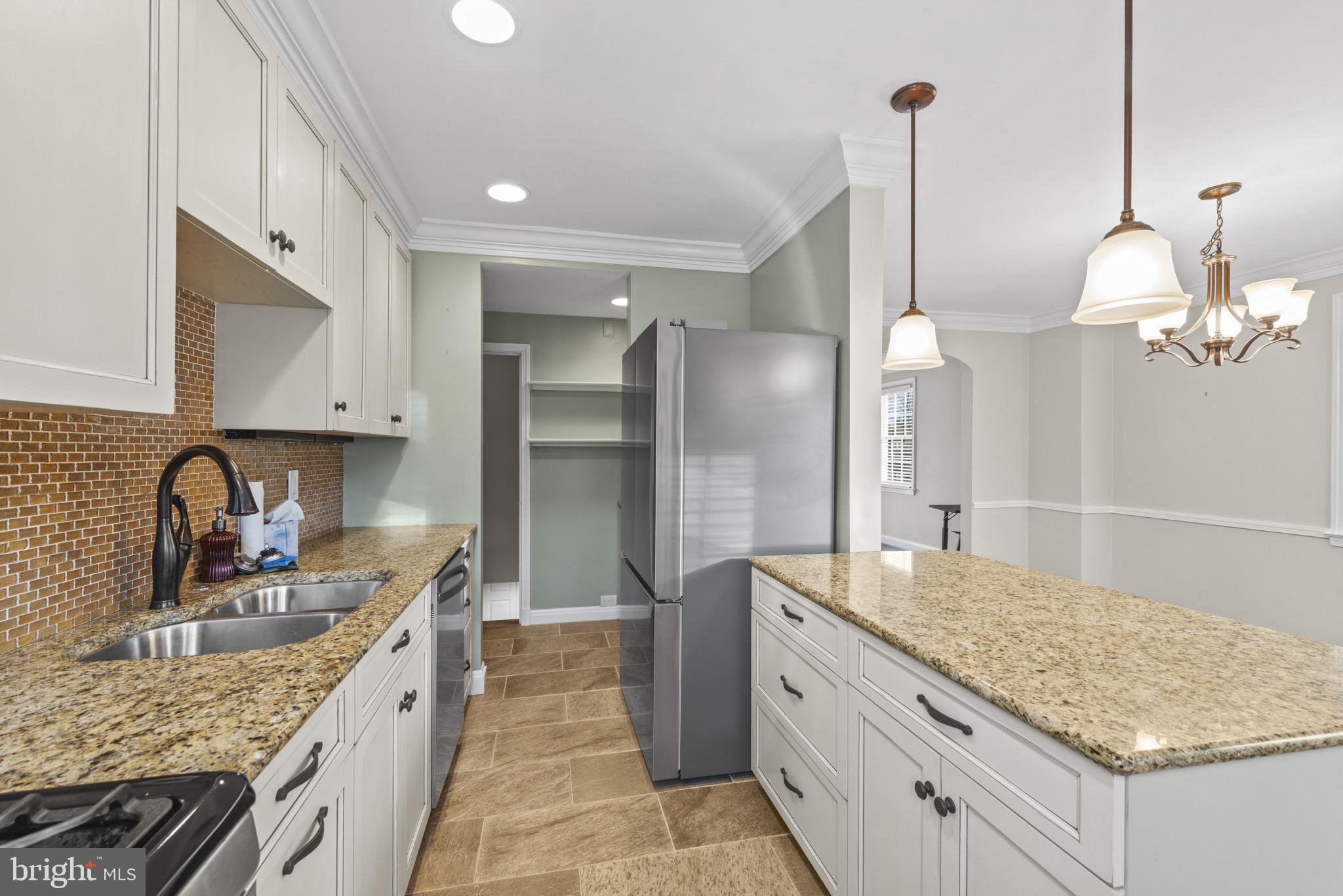 169 Regester Avenue Baltimore, MD 21212 - Photo 6 of 30 Modern kitchen with elegant finishes.