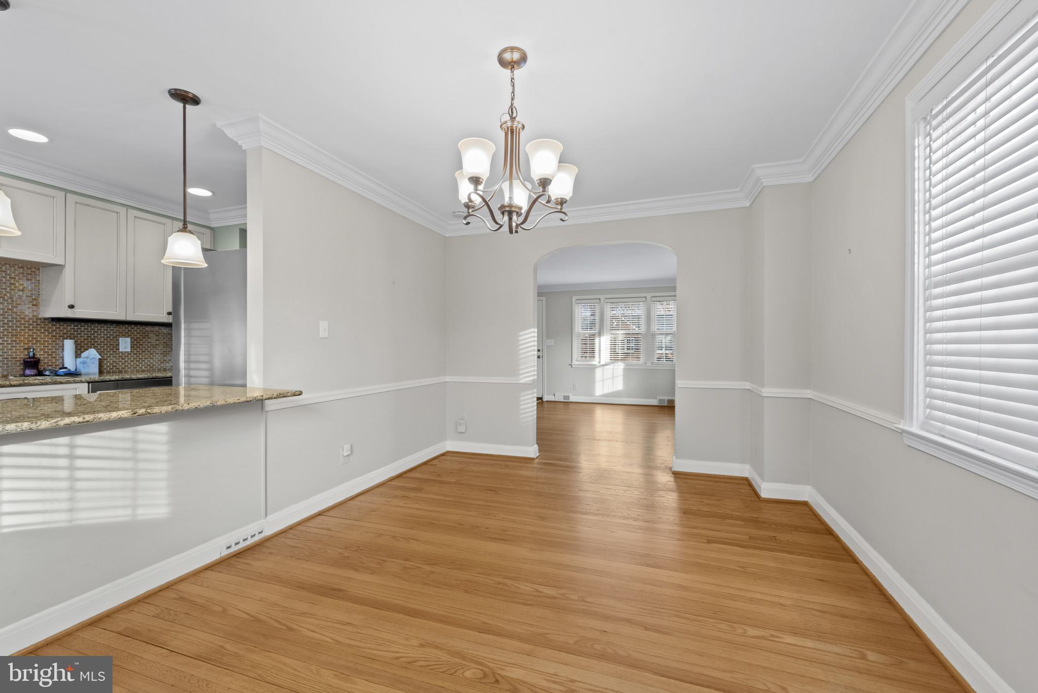 169 Regester Avenue Baltimore, MD 21212 - Photo 7 of 30 Bright and airy dining space with elegance.