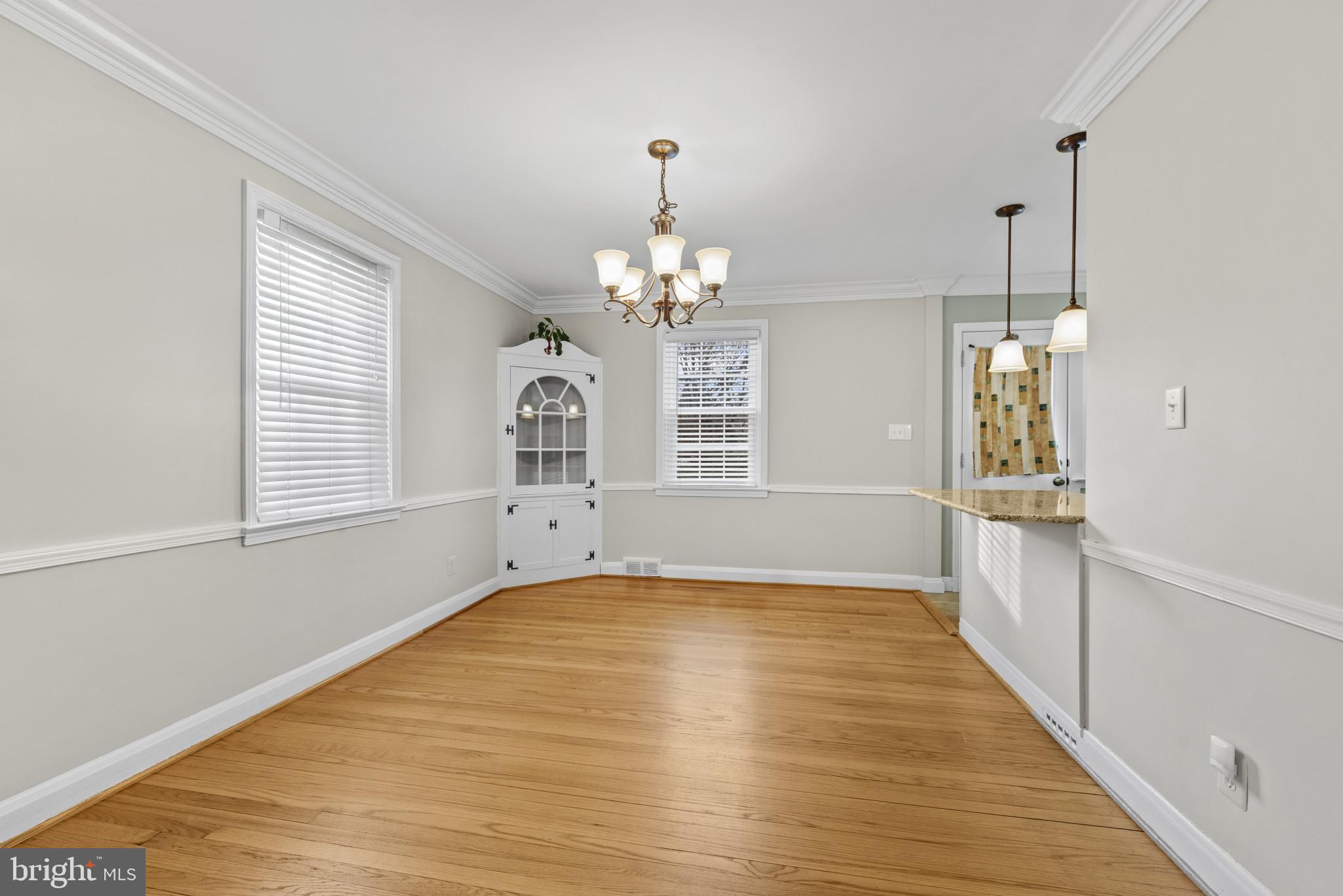 169 Regester Avenue Baltimore, MD 21212 - Photo 8 of 30 Bright and airy dining space with charm.