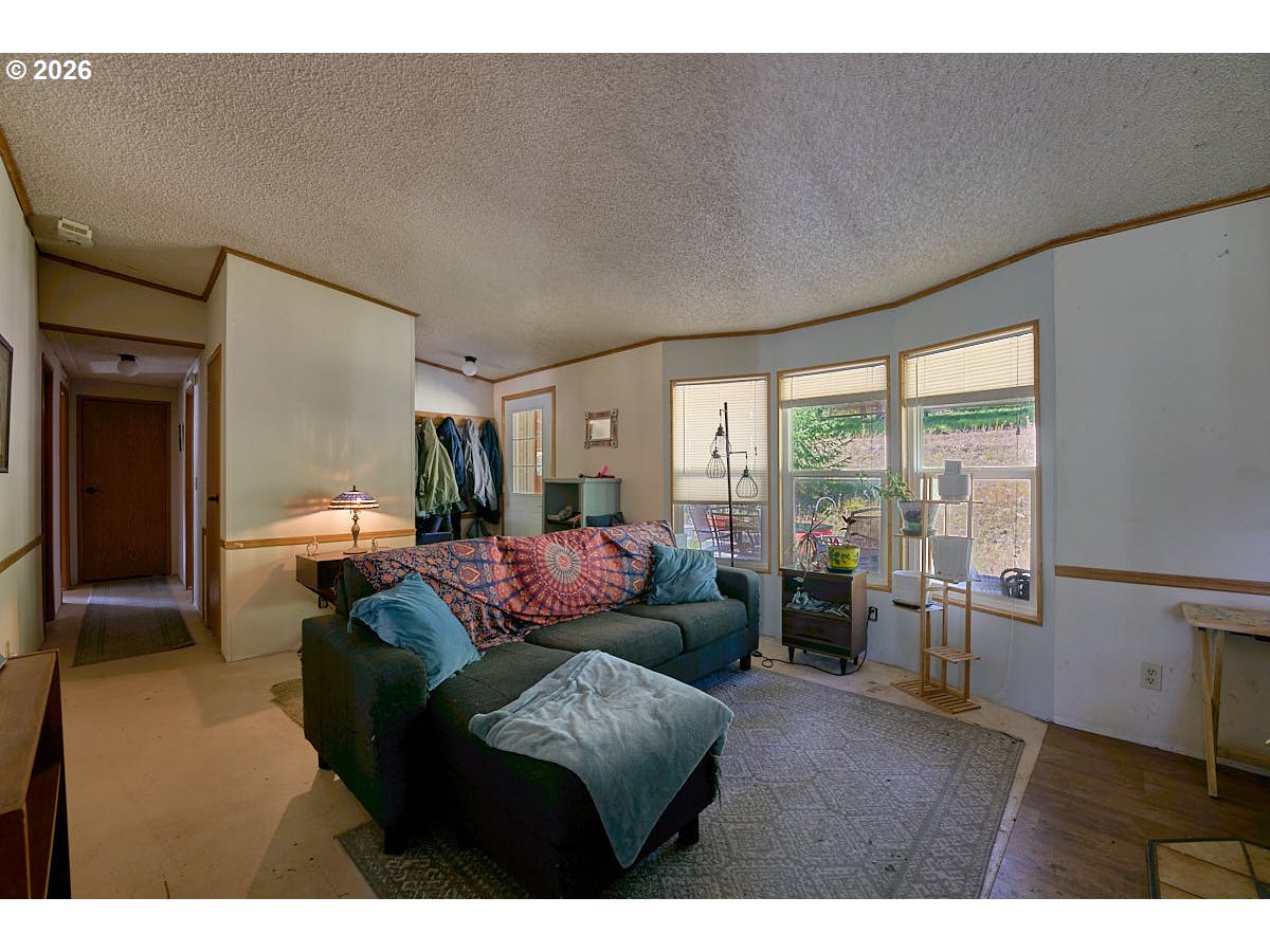 61216 Old Ski Run Road Joseph, OR 97846 - Photo 12 of 27 a living room with furniture and a window