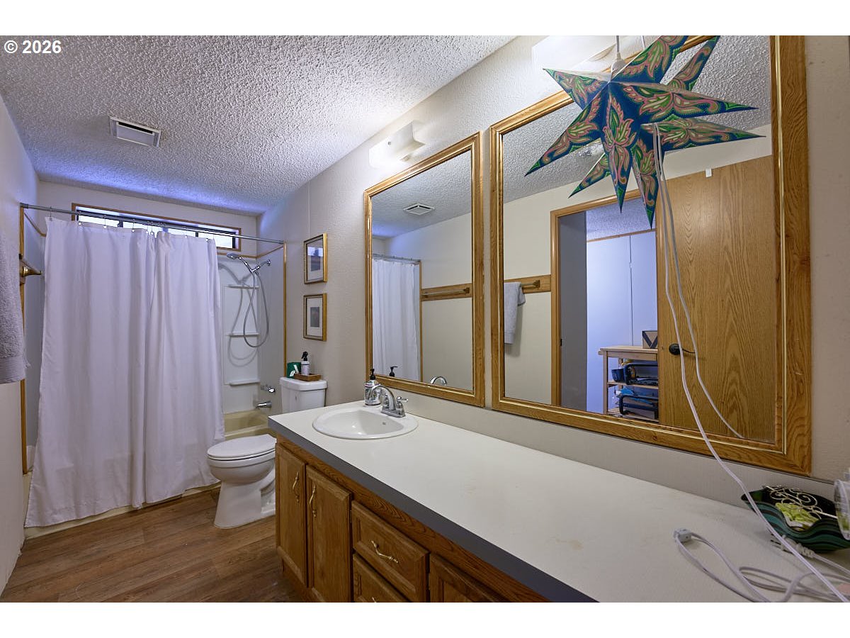 61216 Old Ski Run Road Joseph, OR 97846 - Photo 15 of 27 a bathroom with a sink and a mirror