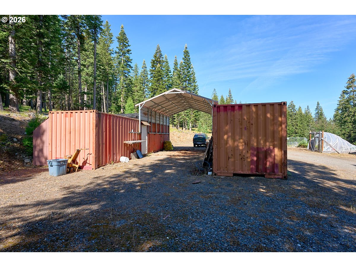 61216 Old Ski Run Road Joseph, OR 97846 - Photo 21 of 27 a view of a house with backyard and sitting area