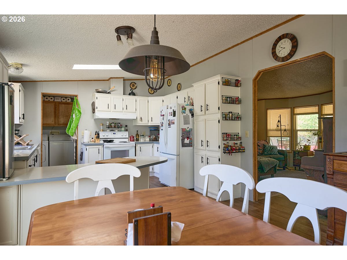 61216 Old Ski Run Road Joseph, OR 97846 - Photo 6 of 27 a living room with furniture and a large window