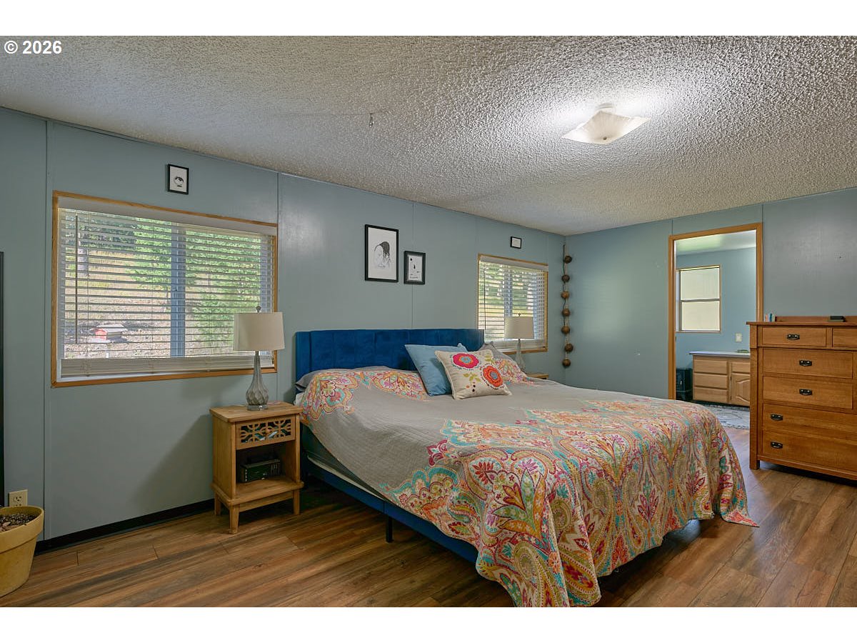 61216 Old Ski Run Road Joseph, OR 97846 - Photo 10 of 27 a bedroom with a bed and a dresser
