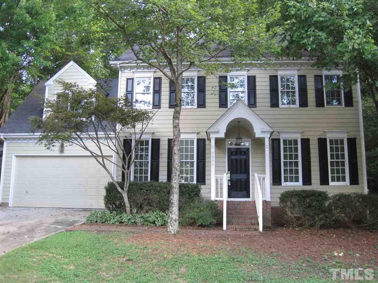 9904 Bright Hedge Court Raleigh, NC 27613 - Photo 1 of 20 a front view of a house with garden