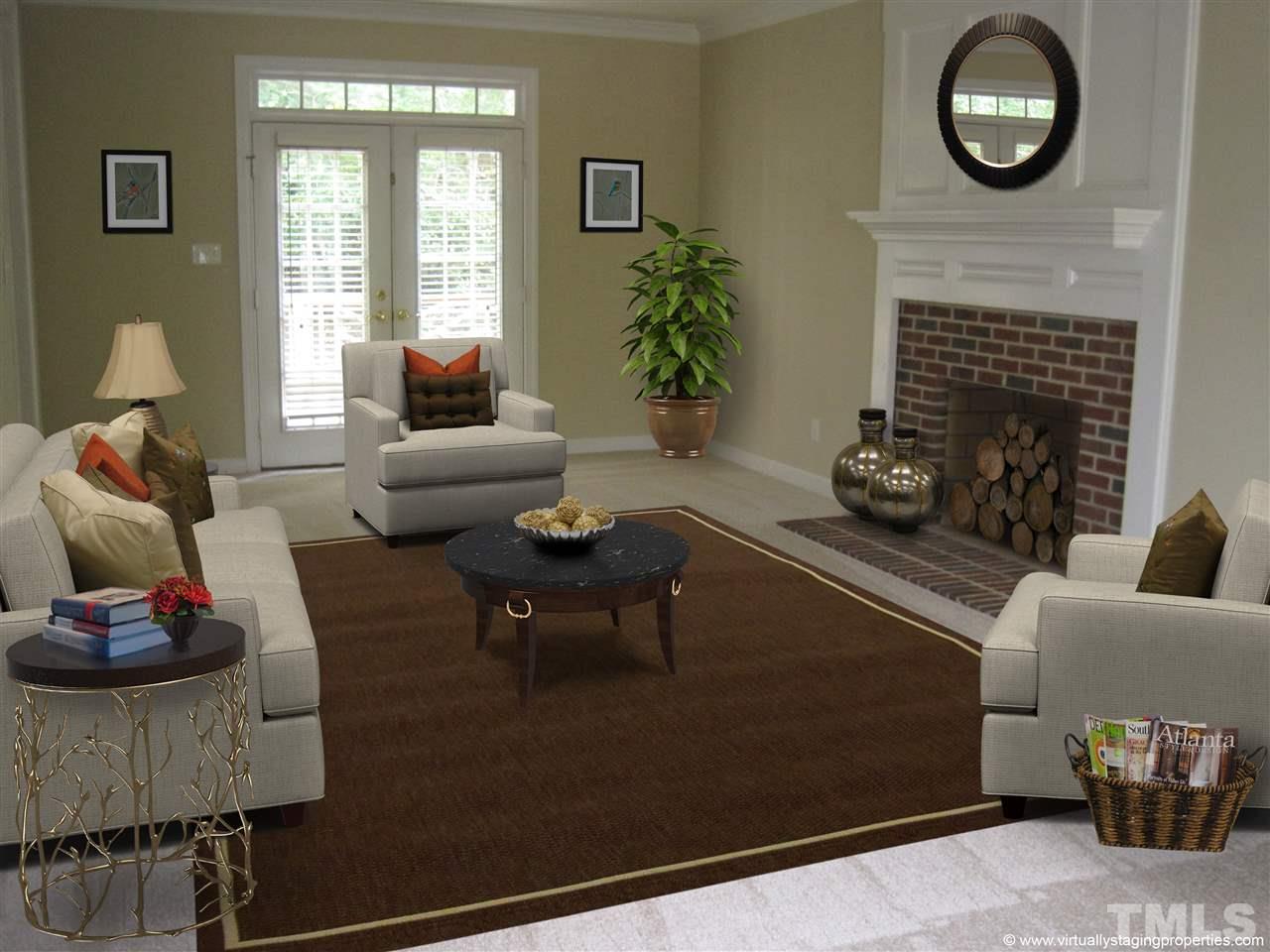 9904 Bright Hedge Court Raleigh, NC 27613 - Photo 4 of 20 a living room with furniture fireplace and window