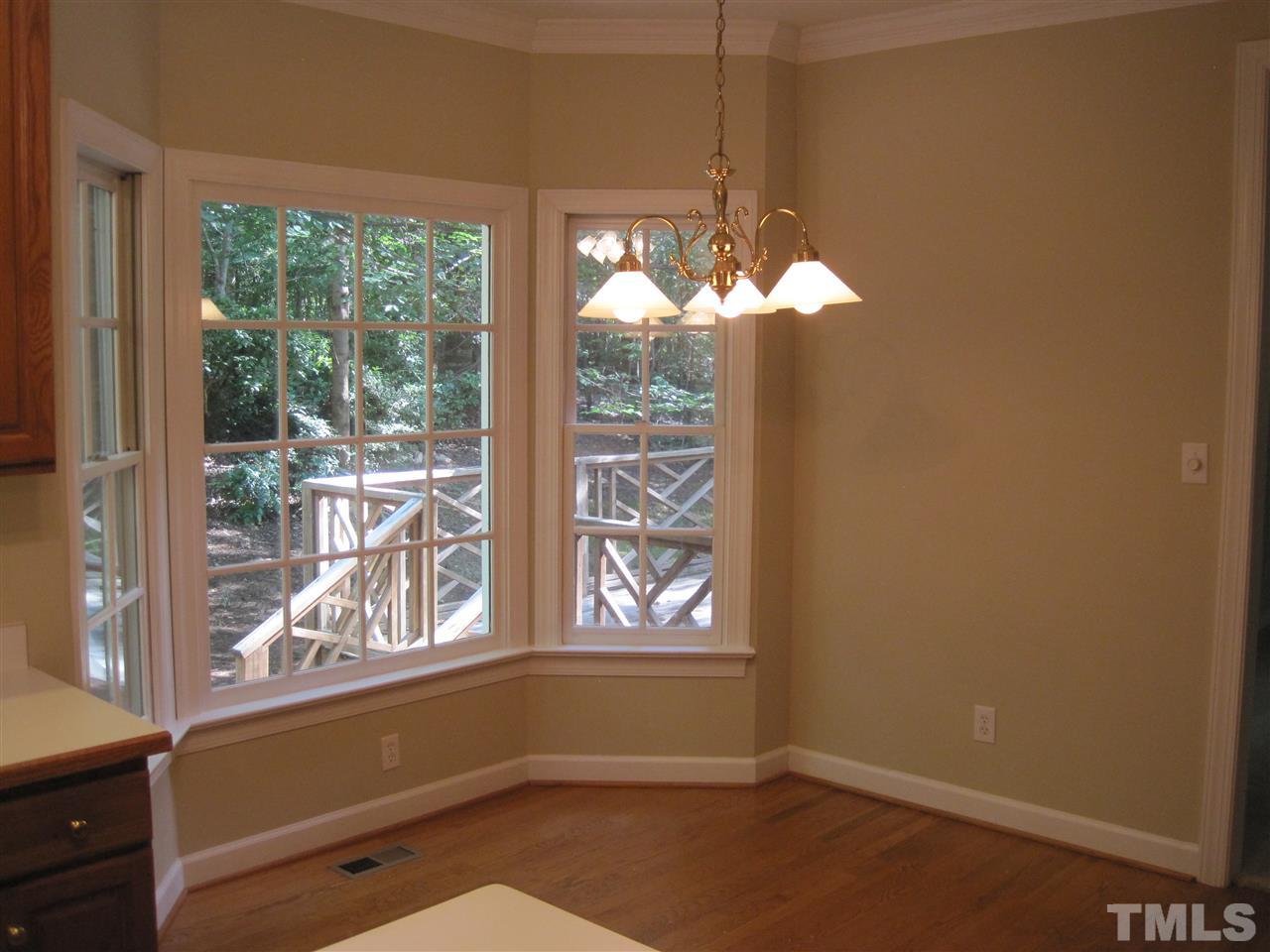 9904 Bright Hedge Court Raleigh, NC 27613 - Photo 9 of 20 a window in a room with a window