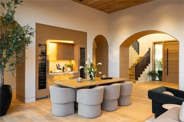 a view of living room with furniture and a potted plant