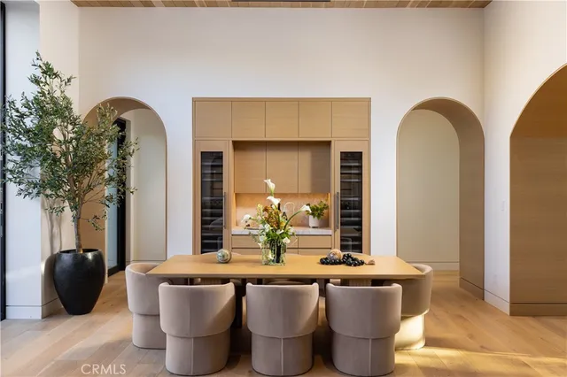 a dining room with table and chairs