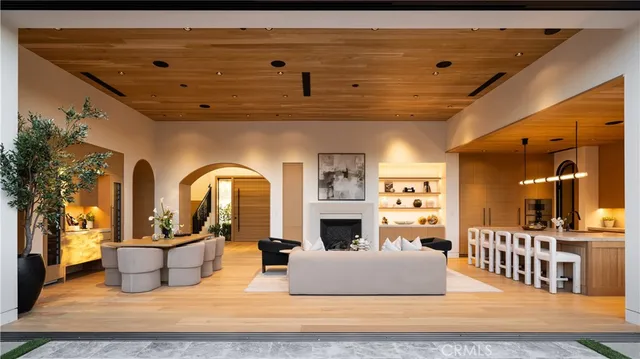 a living room with furniture and flat screen tv