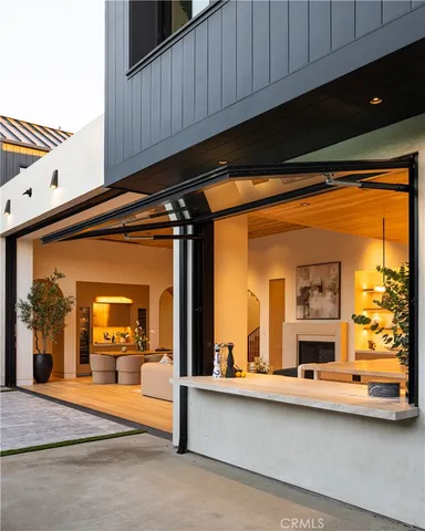 a view of living room with furniture and a fireplace