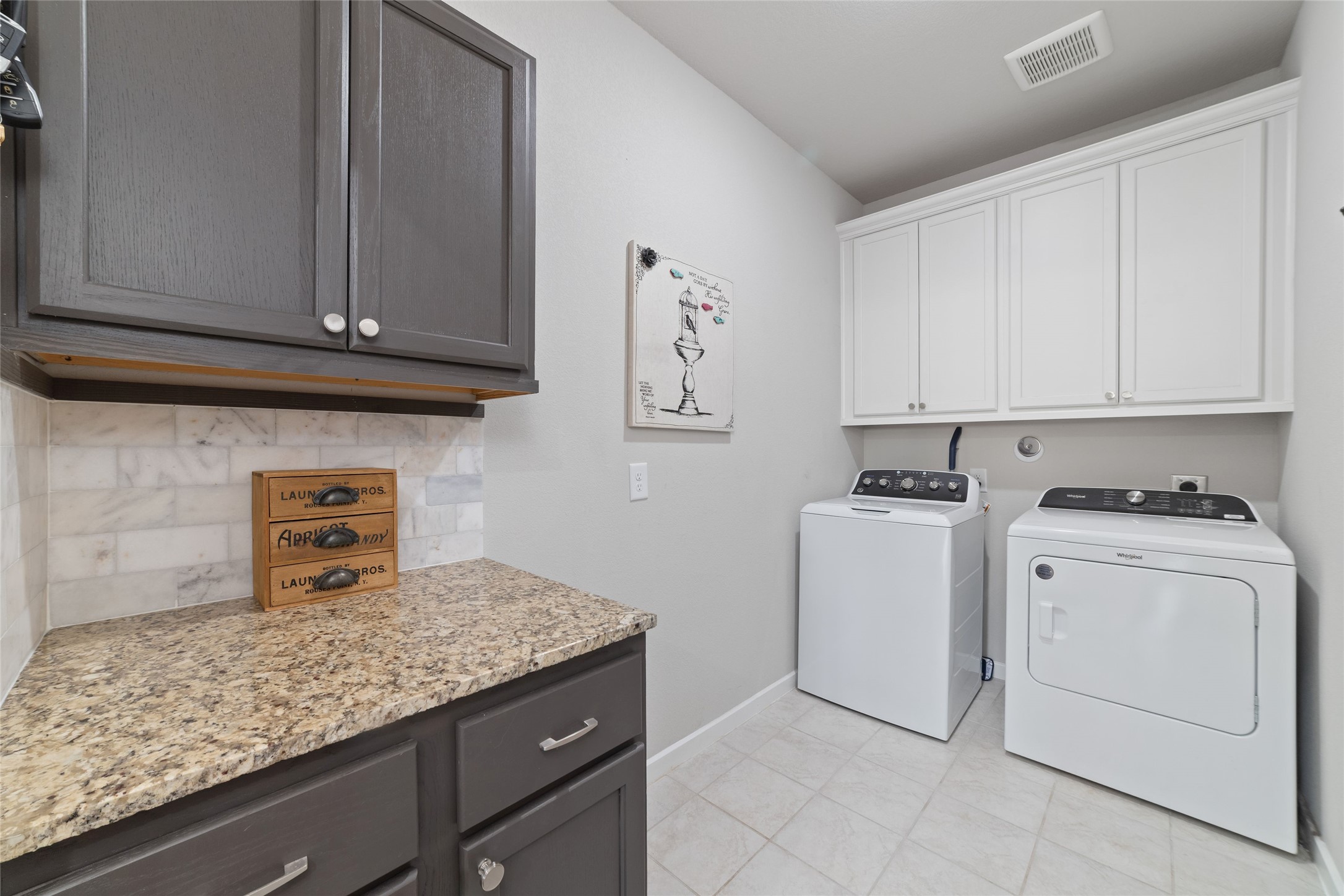 22122 Sam Raburn Drive Tomball, TX 77375 - Photo 15 of 47 Enjoy your spacious laundry room with new cabinets added for convenience.