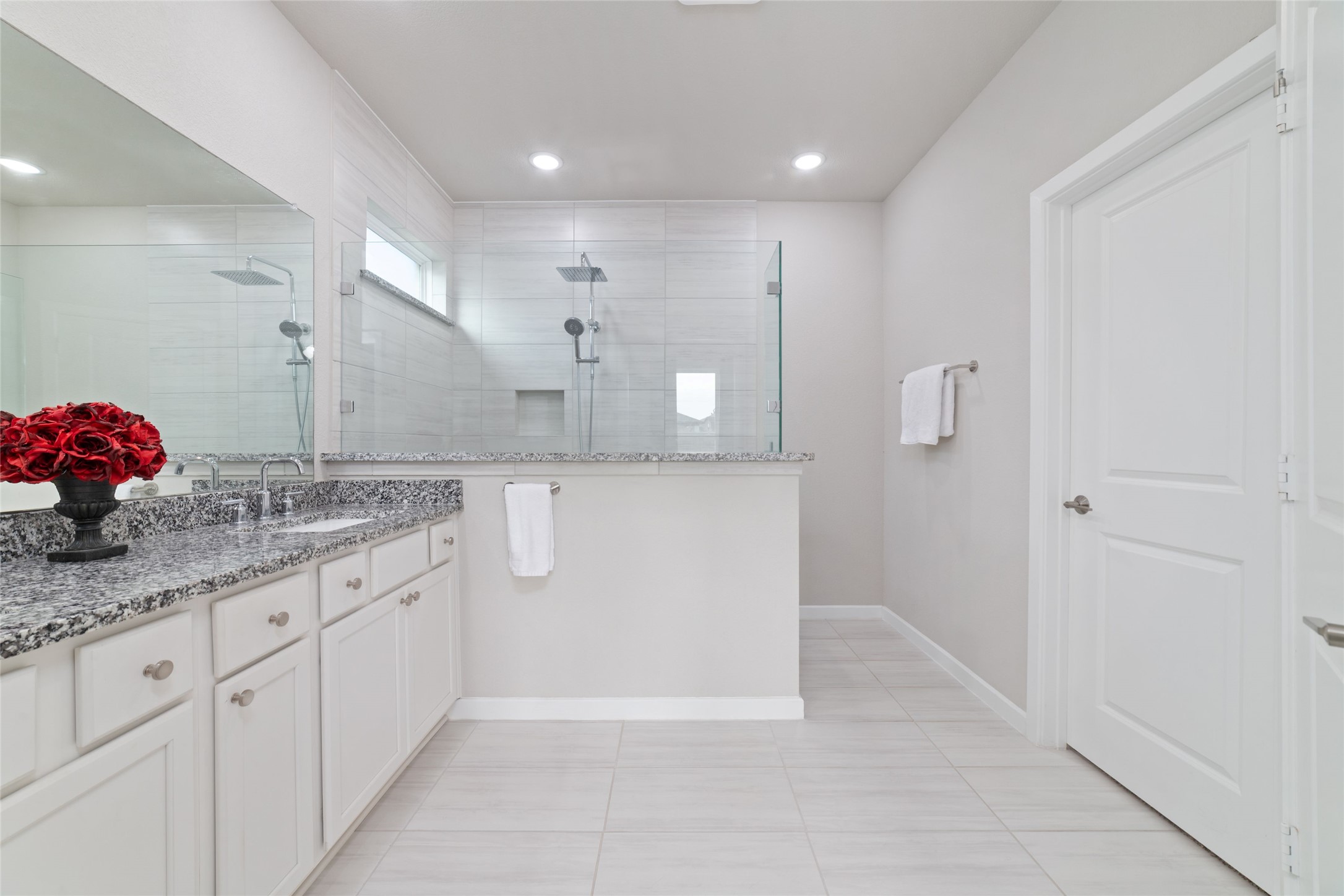 22122 Sam Raburn Drive Tomball, TX 77375 - Photo 28 of 47 The primary bathroom offers a spa like atmosphere with it's elegant design.