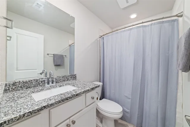 a view of a house with swimming pool and a yard