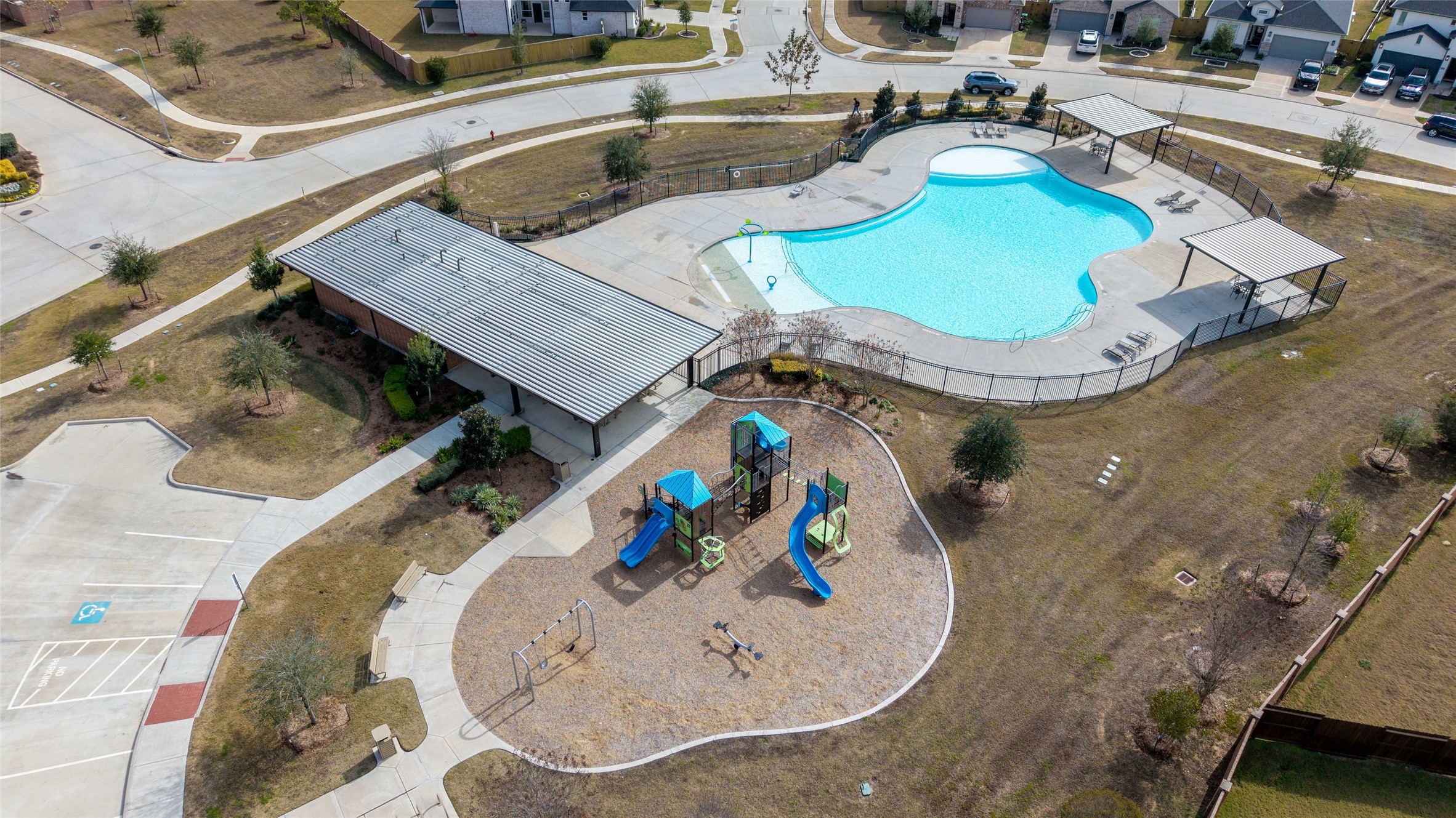 22122 Sam Raburn Drive Tomball, TX 77375 - Photo 44 of 47 an aerial view of a swimming pool with outdoor seating