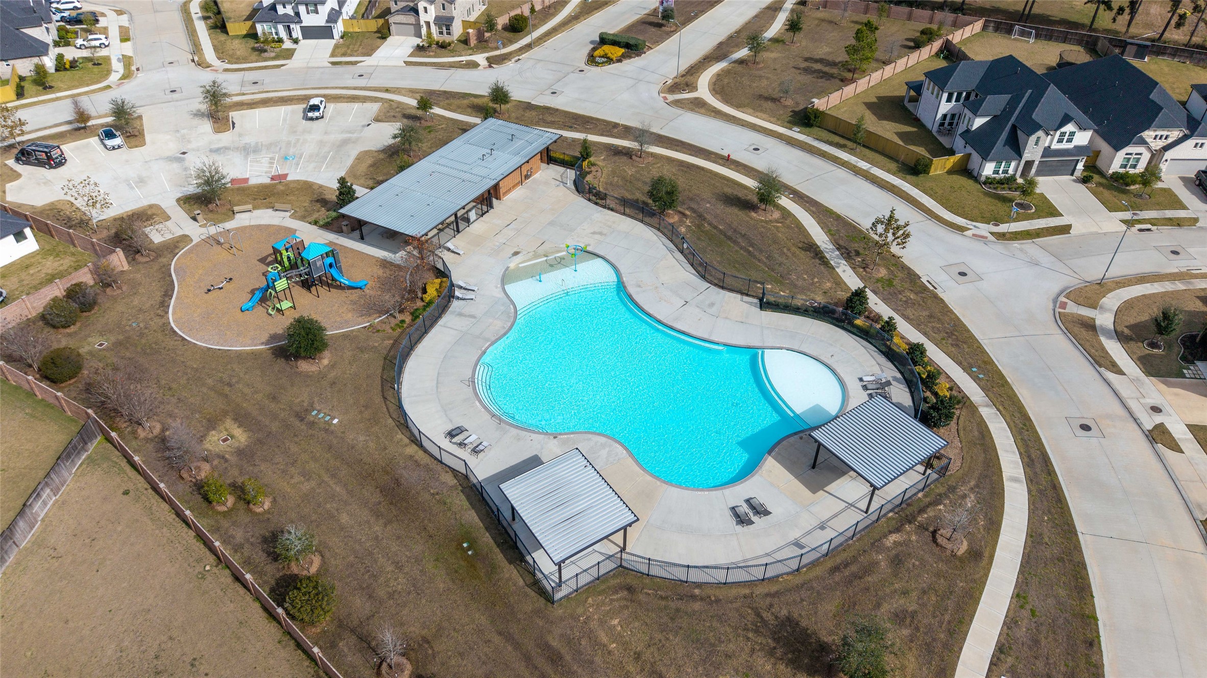 22122 Sam Raburn Drive Tomball, TX 77375 - Photo 45 of 47 an aerial view of a house with a swimming pool