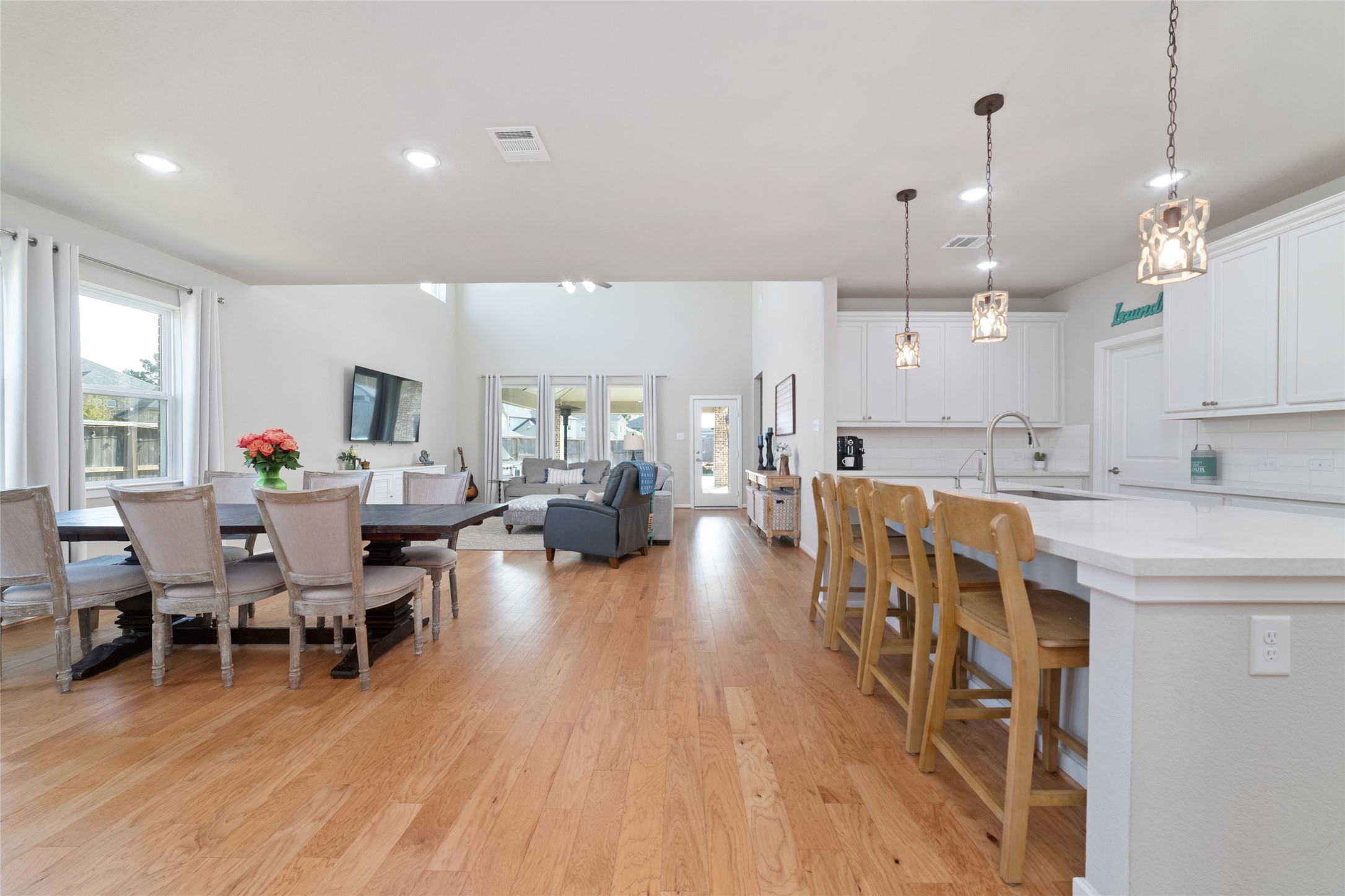 22122 Sam Raburn Drive Tomball, TX 77375 - Photo 8 of 47 Never miss out while one is cooking. Have a seat at the bar or pull out a chair in the dining room.