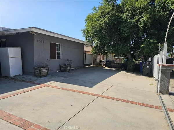 a backyard of a house with seating space