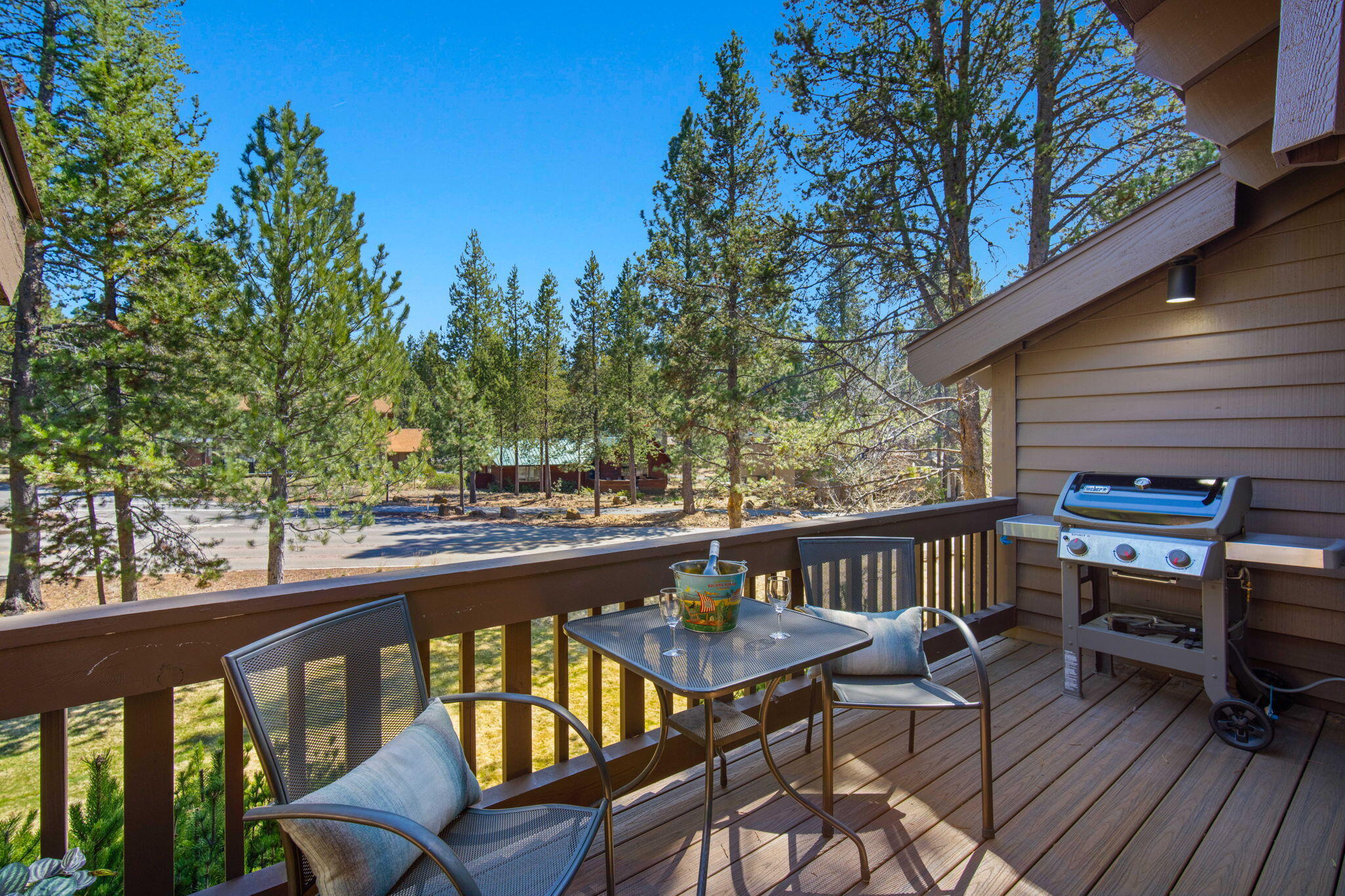57305 Beaver Ridge Loop, Unit 8 Sunriver, OR 97707 - Photo 12 of 25 a view of a balcony with chairs