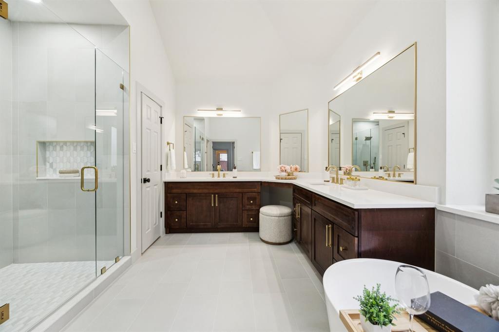 2437 Clear Field Drive Plano, TX 75025 - Photo 3 of 38 a bathroom with a double vanity sink mirror and shower