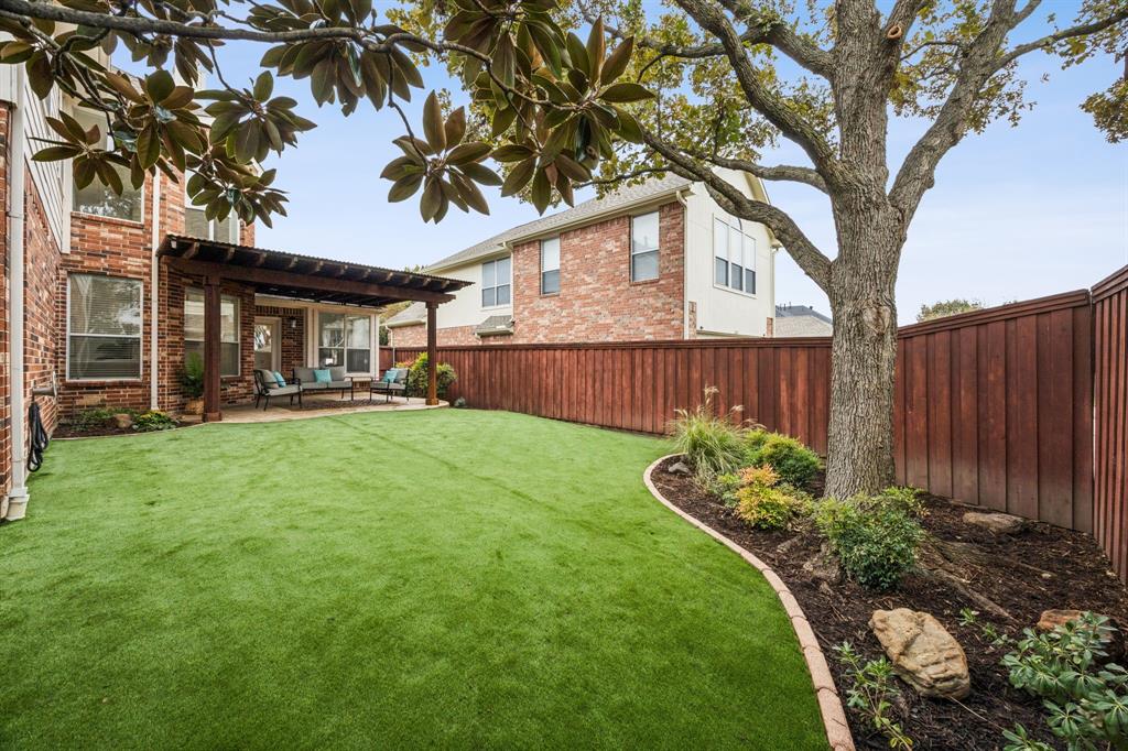 2437 Clear Field Drive Plano, TX 75025 - Photo 32 of 38 a garden view with a seating space