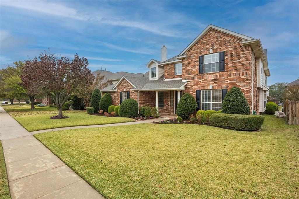 2437 Clear Field Drive Plano, TX 75025 - Photo 37 of 38 a view of a house with a swimming pool and a yard