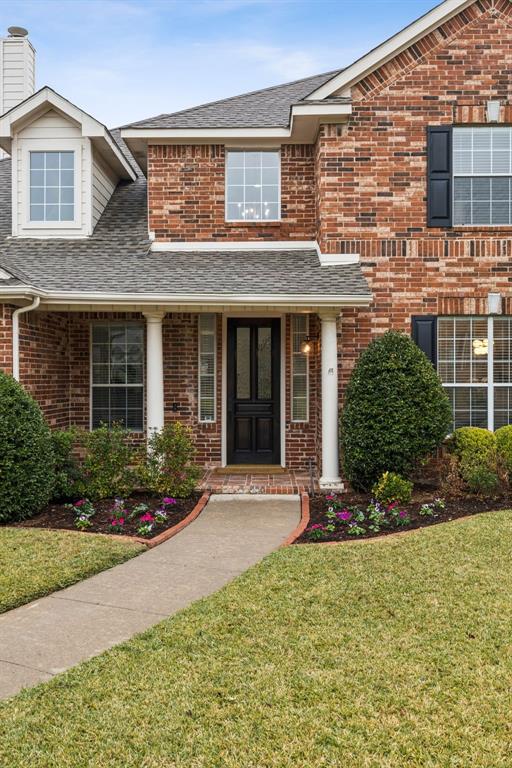 2437 Clear Field Drive Plano, TX 75025 - Photo 38 of 38 a front view of a house with garden