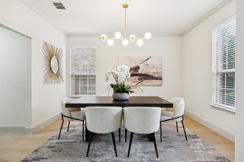 2437 Clear Field Drive Plano, TX 75025 - Photo 8 of 38 a dining room with furniture and window