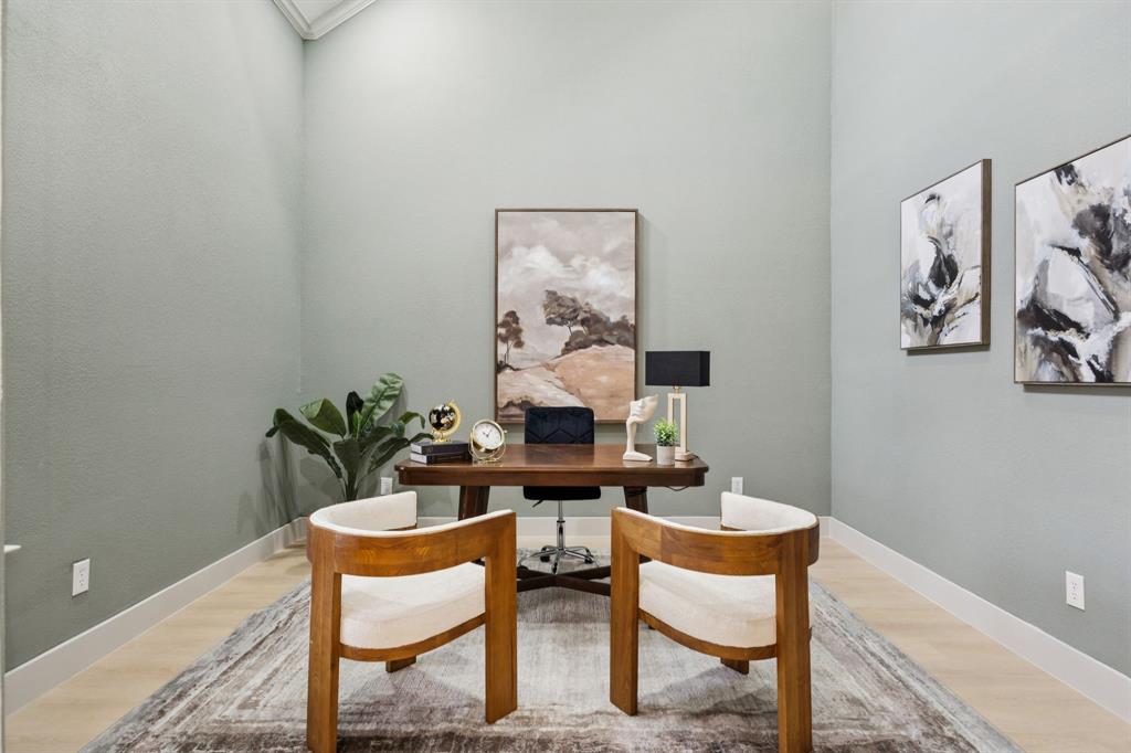2437 Clear Field Drive Plano, TX 75025 - Photo 9 of 38 a view of a workspace room with furniture and wooden floor