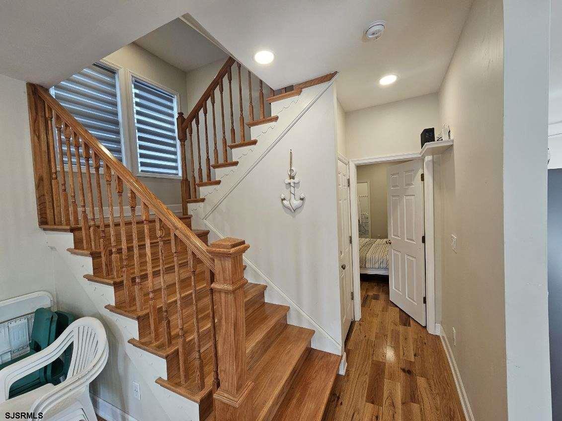 27 South Little Rock Avenue, Unit MAY 2026 Ventnor City, NJ 08406 - Photo 27 of 91 a view of entryway and hall with wooden floor