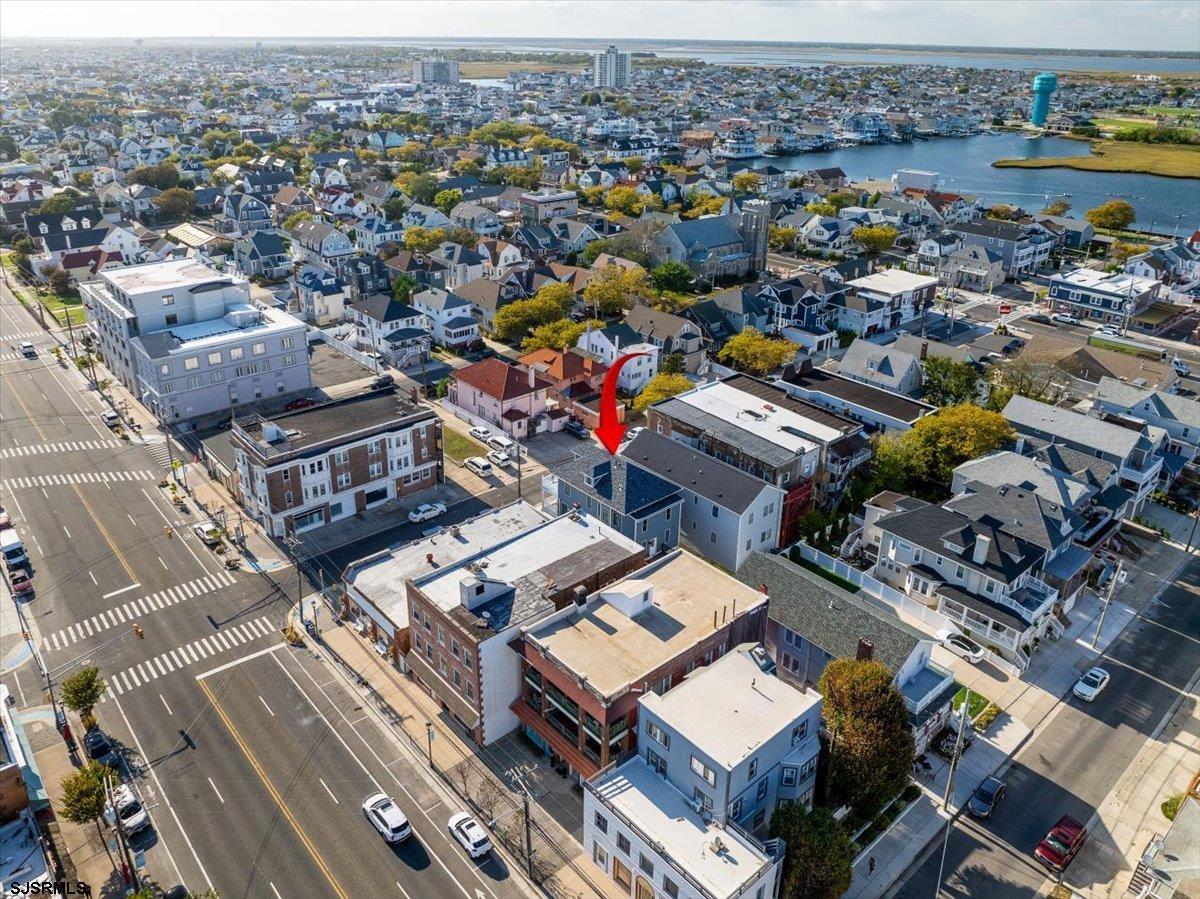 27 South Little Rock Avenue, Unit MAY 2026 Ventnor City, NJ 08406 - Photo 63 of 91 an aerial view of a city with lots of residential buildings