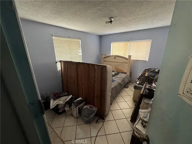 a view of a livingroom with furniture and windows