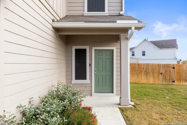 a view of a entryway door front of house