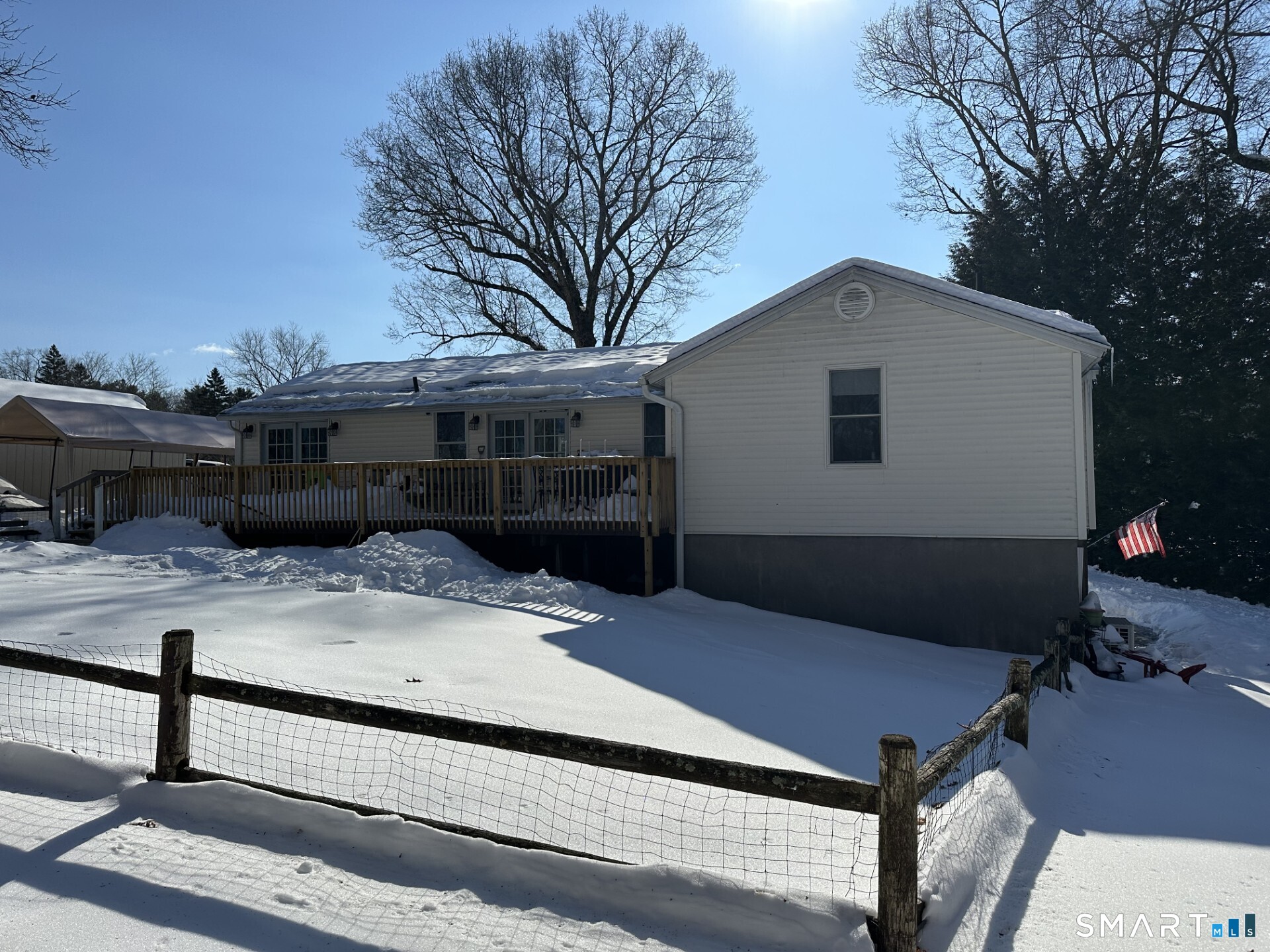 215 Spring Street Manchester, CT 06040 - Photo 7 of 10 Back of house with fenced in area.