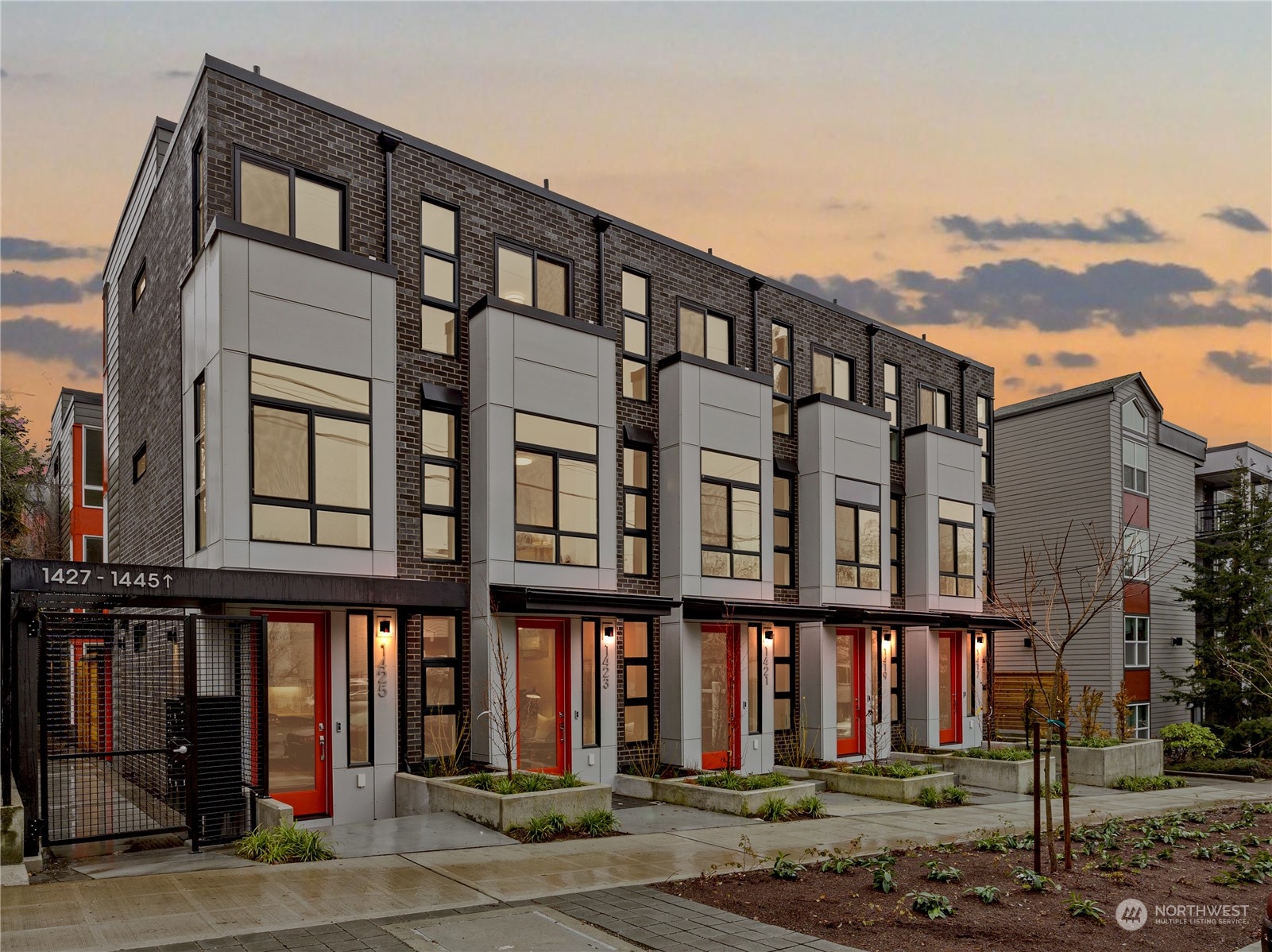 1425 East Howell Street Seattle, WA 98122 - Photo 1 of 20 front view of a building with a street