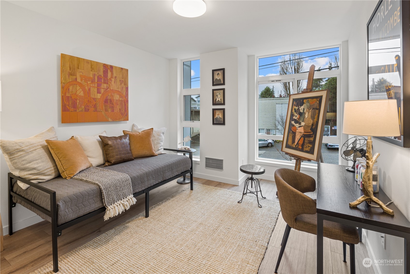 1425 East Howell Street Seattle, WA 98122 - Photo 11 of 20 a living room with furniture a rug and wall painting