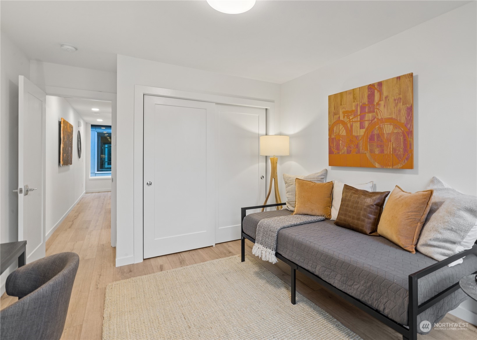 1425 East Howell Street Seattle, WA 98122 - Photo 12 of 20 a bedroom with a bed and a couch