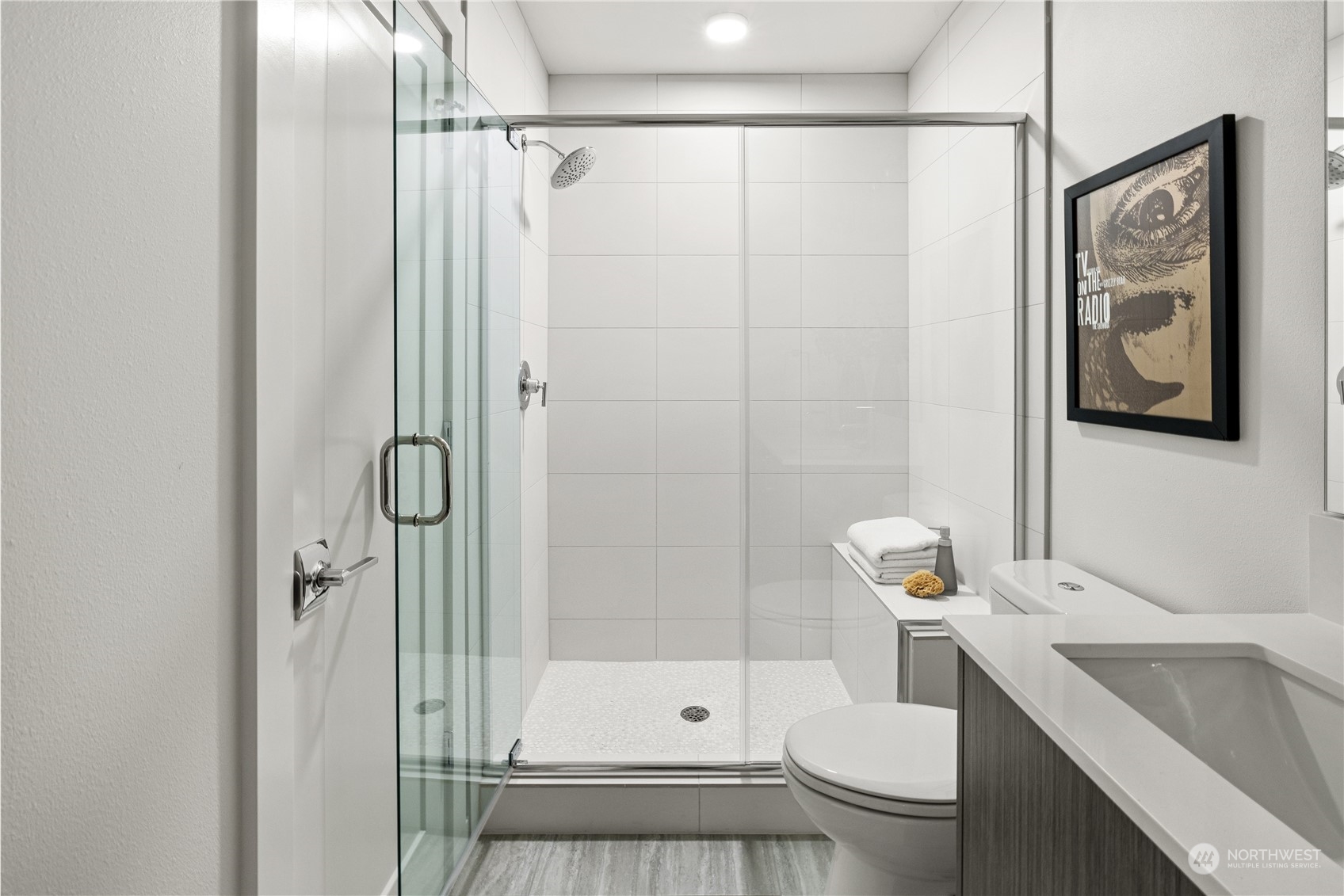 1425 East Howell Street Seattle, WA 98122 - Photo 14 of 20 a bathroom with a shower a toilet and sink